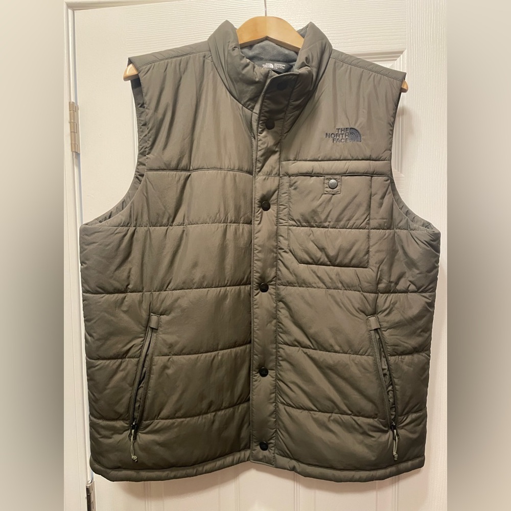 Men’s size large, army green North Face puffer vest, worn once.
